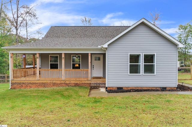 view of front of home featuring a front yard and covered porch