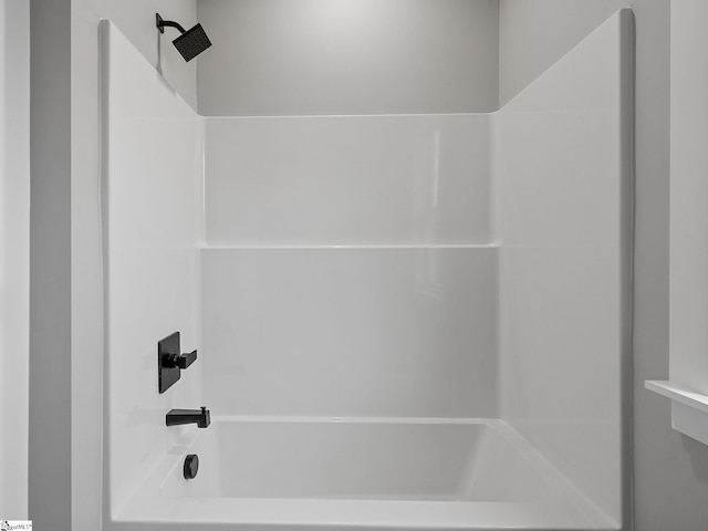 bathroom with shower / bathtub combination