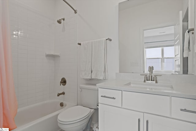 full bathroom featuring vanity, toilet, and shower / bathtub combination with curtain