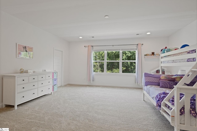 bedroom with light carpet