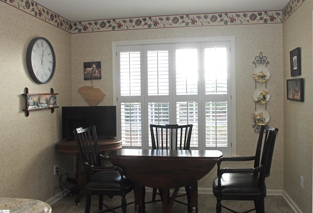 dining area with plenty of natural light