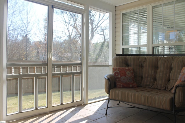 sunroom / solarium featuring a healthy amount of sunlight