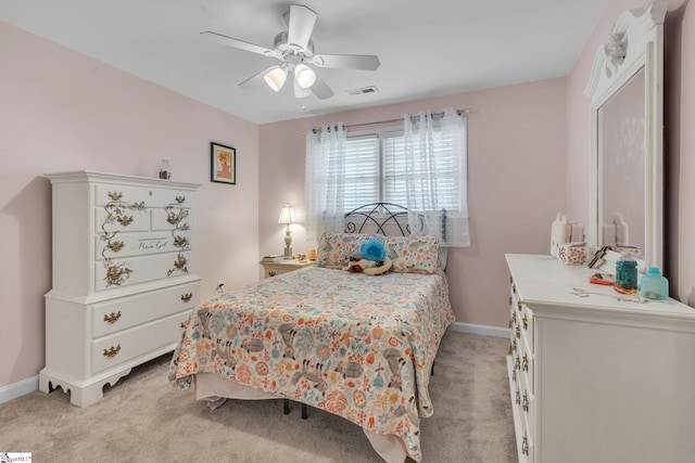 bedroom featuring ceiling fan and light colored carpet