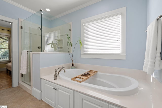 bathroom featuring shower with separate bathtub, tile patterned floors, and ornamental molding