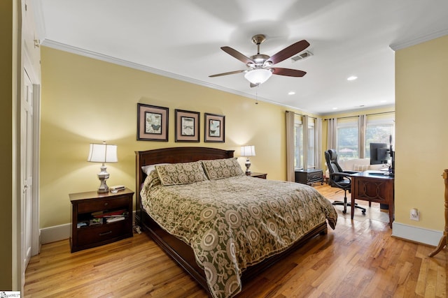 bedroom with ceiling fan, light hardwood / wood-style flooring, and crown molding