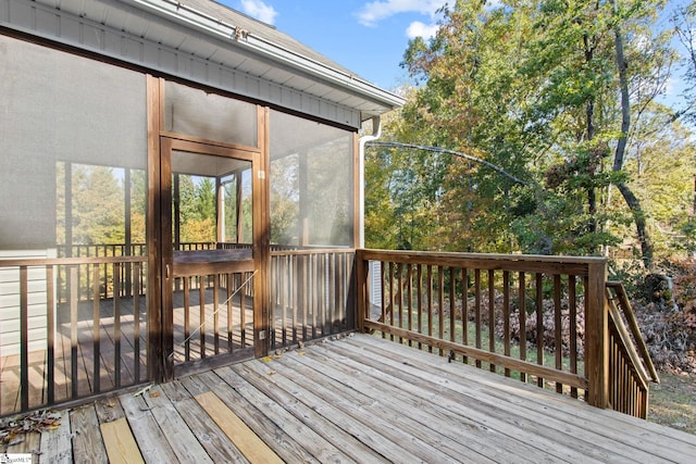 deck featuring a sunroom