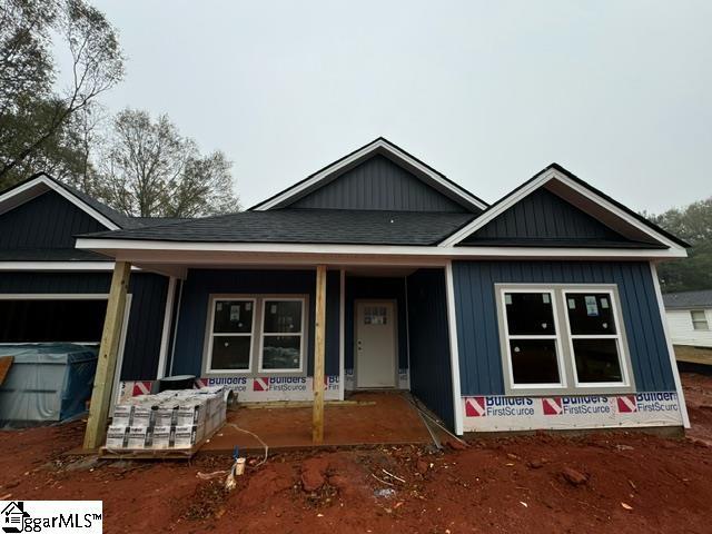 view of front of home featuring covered porch