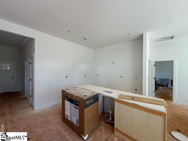 kitchen featuring light brown cabinets