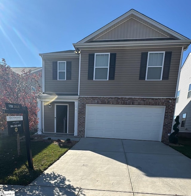 view of front property with a garage