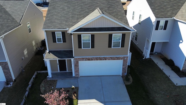 view of front of property featuring a garage