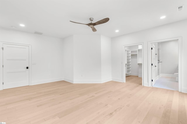 interior space with ceiling fan and light hardwood / wood-style flooring