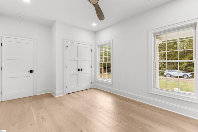 interior space featuring ceiling fan and light hardwood / wood-style floors