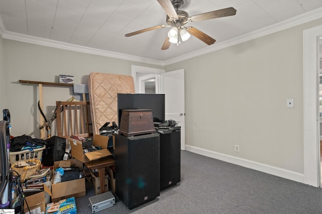 home office featuring carpet flooring, crown molding, and ceiling fan