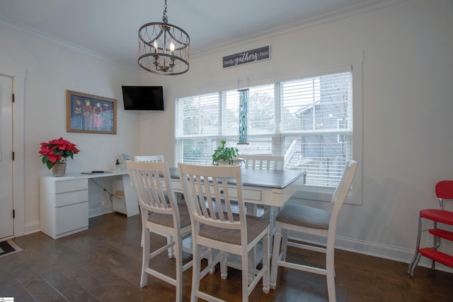 dining room with crown molding, dark wood-type flooring, and an inviting chandelier