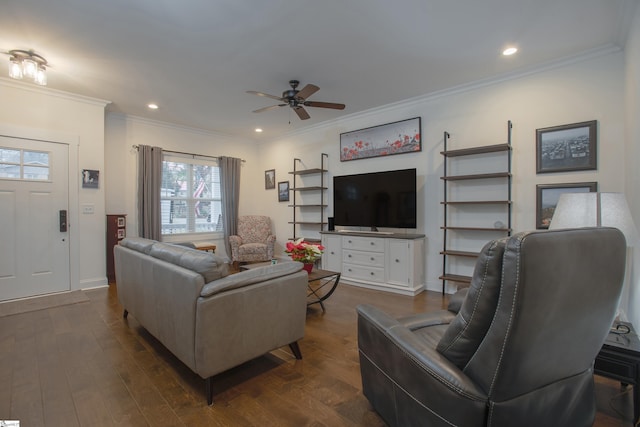 living room featuring crown molding, ceiling fan, and dark wood-type flooring