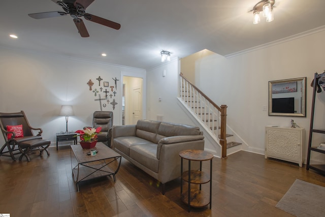 living room with crown molding, ceiling fan, and dark hardwood / wood-style floors