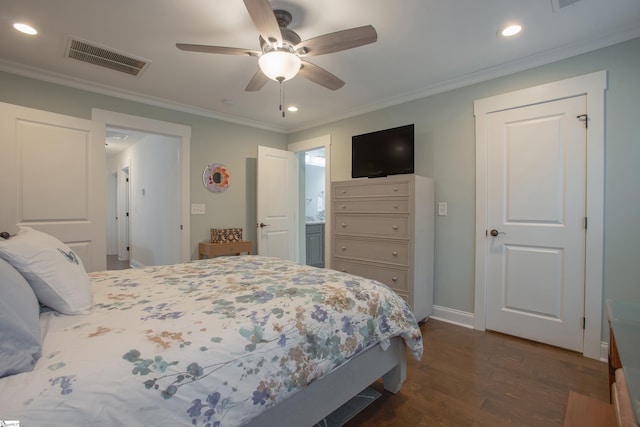 bedroom featuring ensuite bath, ceiling fan, dark hardwood / wood-style flooring, and crown molding