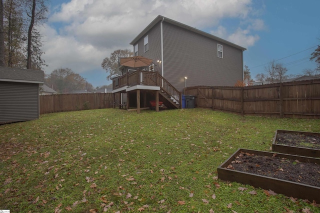 view of yard with a wooden deck