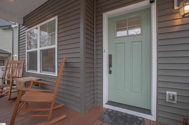 property entrance featuring covered porch