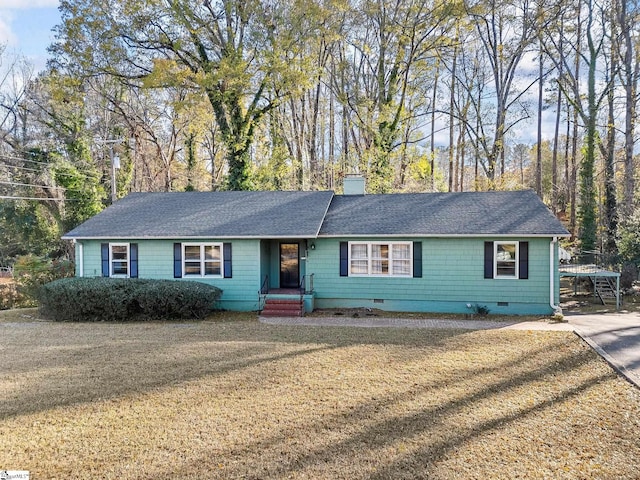 single story home with a front yard