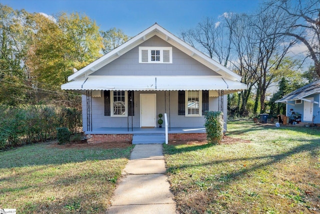 bungalow with a front yard