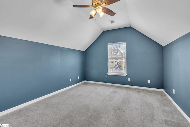 bonus room with ceiling fan, carpet, and vaulted ceiling