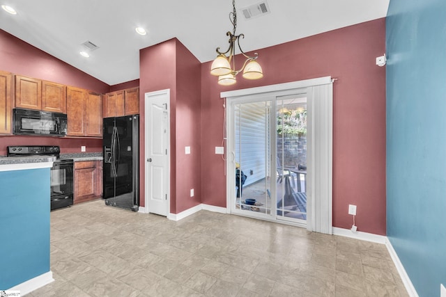 kitchen featuring a chandelier, hanging light fixtures, lofted ceiling, and black appliances