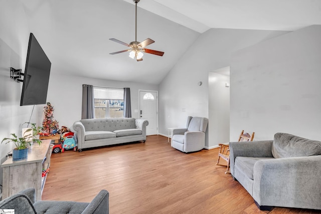 living room featuring light hardwood / wood-style flooring, ceiling fan, and lofted ceiling