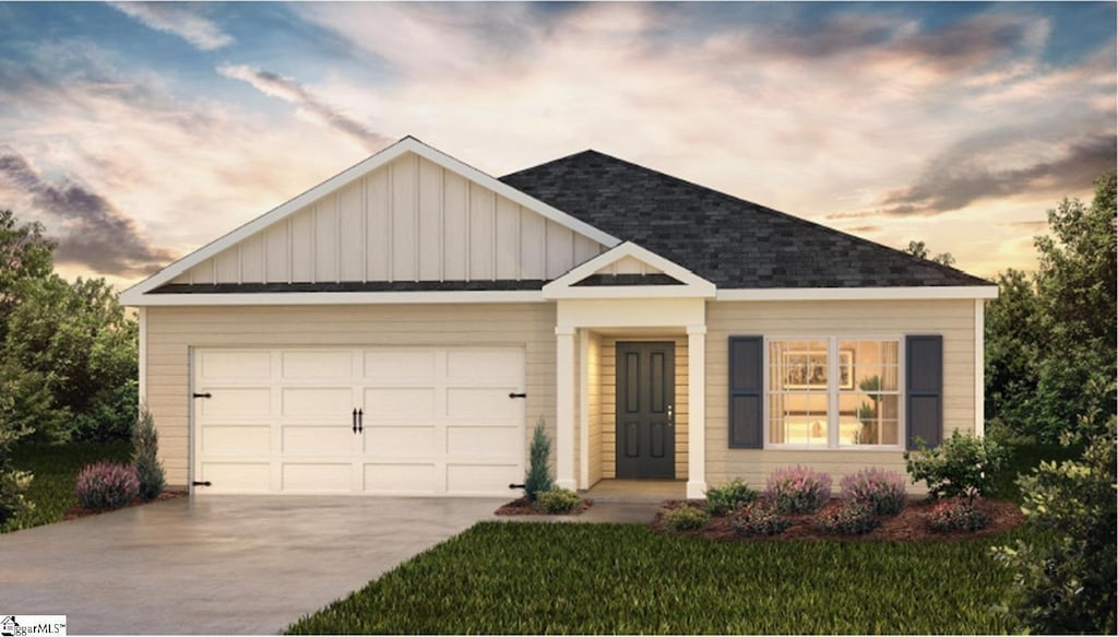 view of front of home with a garage