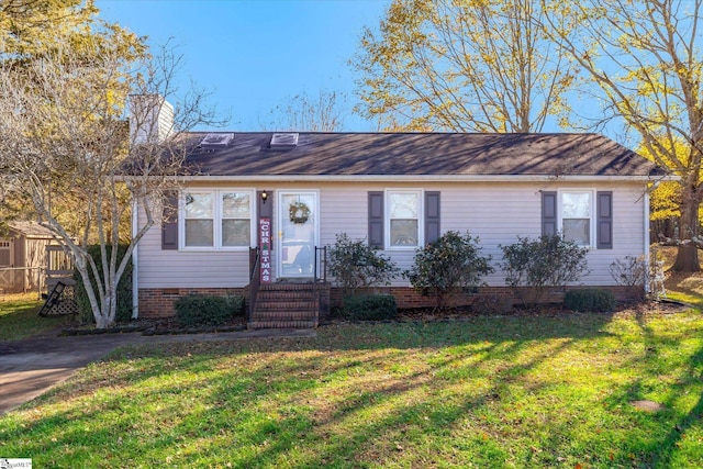 single story home with a front yard