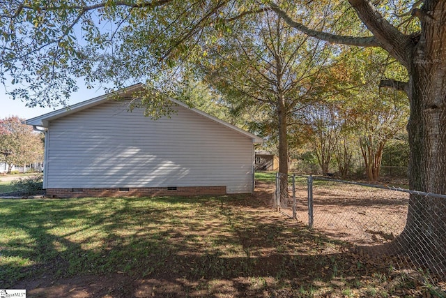 view of home's exterior featuring a lawn