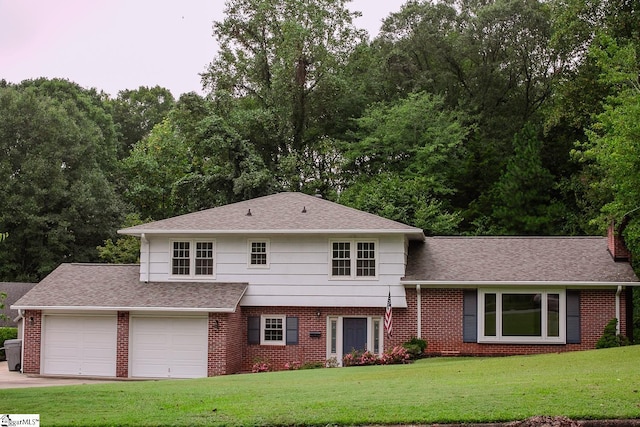 split level home featuring a front lawn