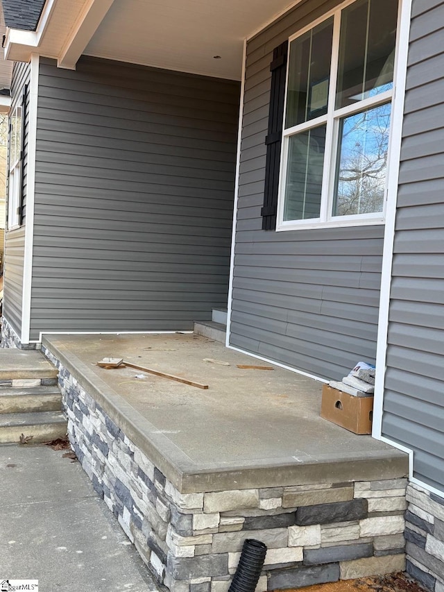 view of patio featuring a porch