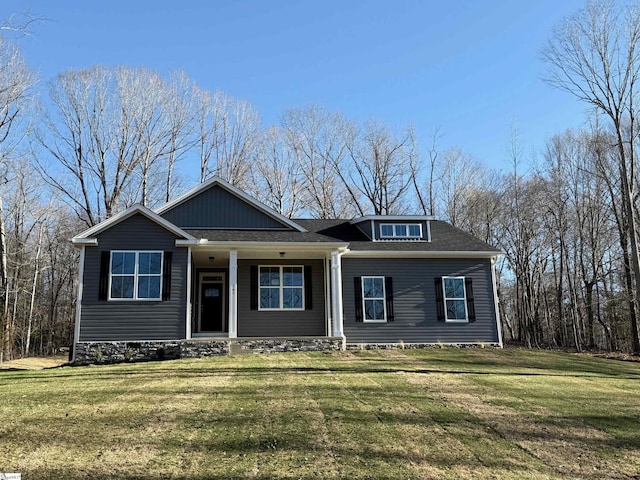 view of front of home with a front yard