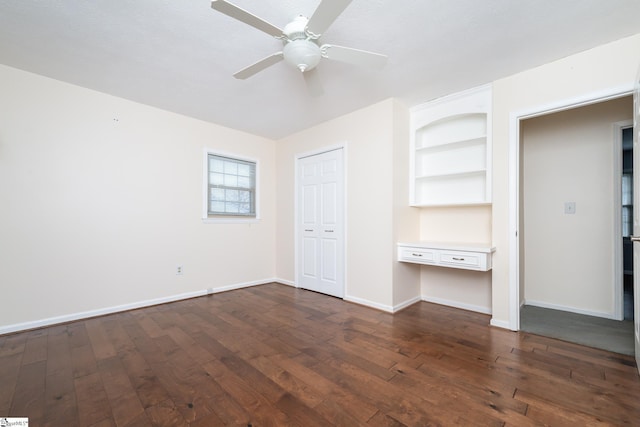 unfurnished bedroom featuring ceiling fan, a closet, and dark hardwood / wood-style floors