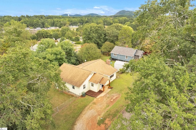 birds eye view of property featuring a mountain view