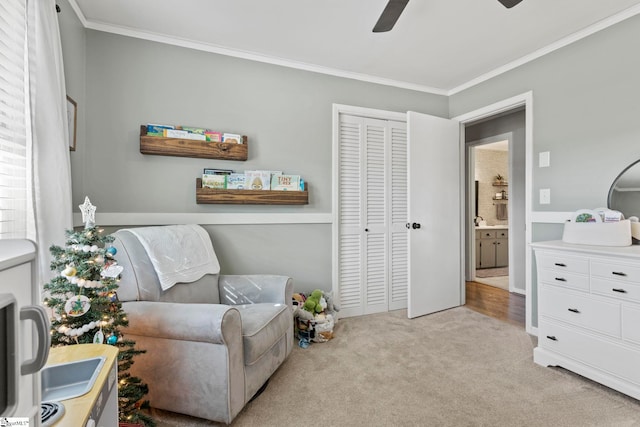 living area with light carpet, ceiling fan, and crown molding