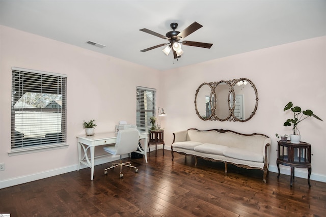 office area featuring ceiling fan and dark wood-type flooring