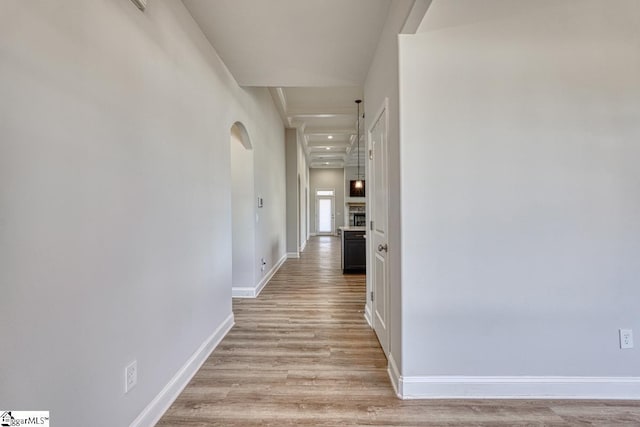 hallway with light wood-type flooring