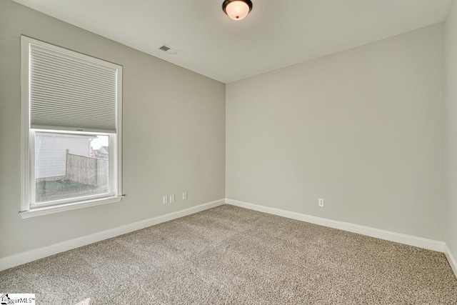 view of carpeted spare room