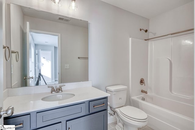 full bathroom featuring tile patterned flooring, vanity, shower / bathtub combination, and toilet