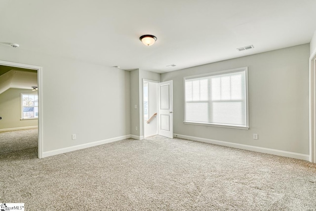 empty room featuring carpet floors