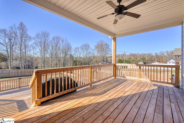 wooden deck with ceiling fan