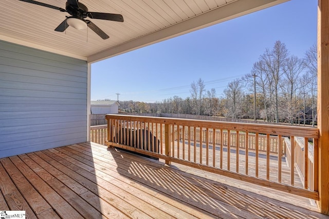 wooden terrace with ceiling fan