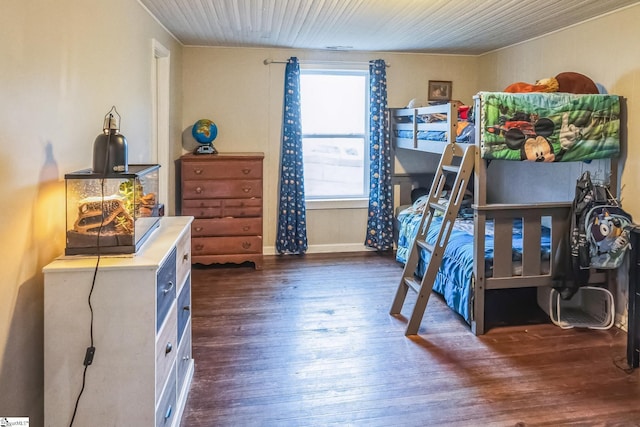 bedroom featuring dark wood-type flooring