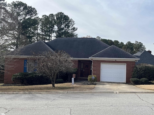 single story home with a garage