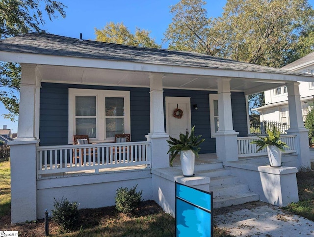 bungalow-style home featuring covered porch