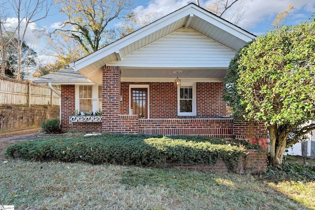 bungalow-style home featuring covered porch