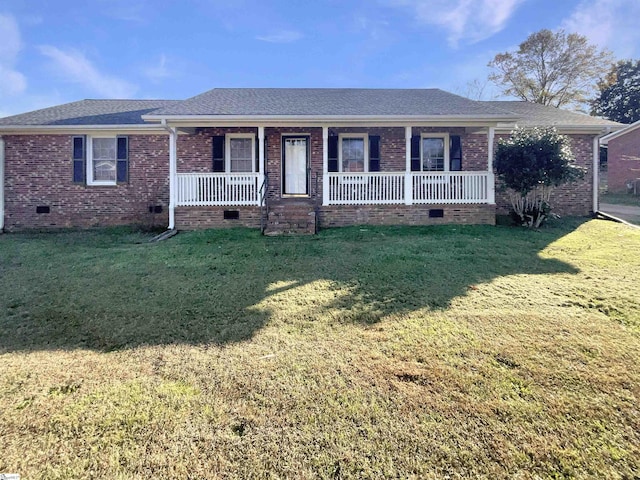 single story home featuring a front yard and covered porch