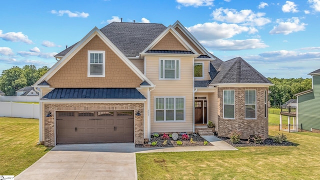 craftsman-style house with a front yard and a garage